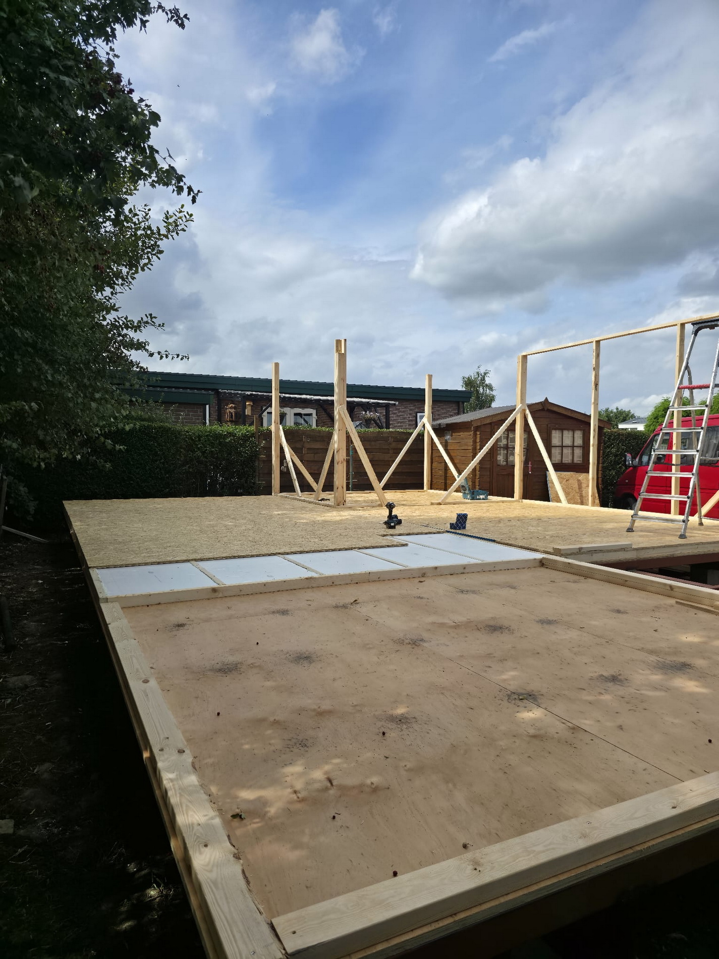 First timber wall frames raised on the completed floor platform