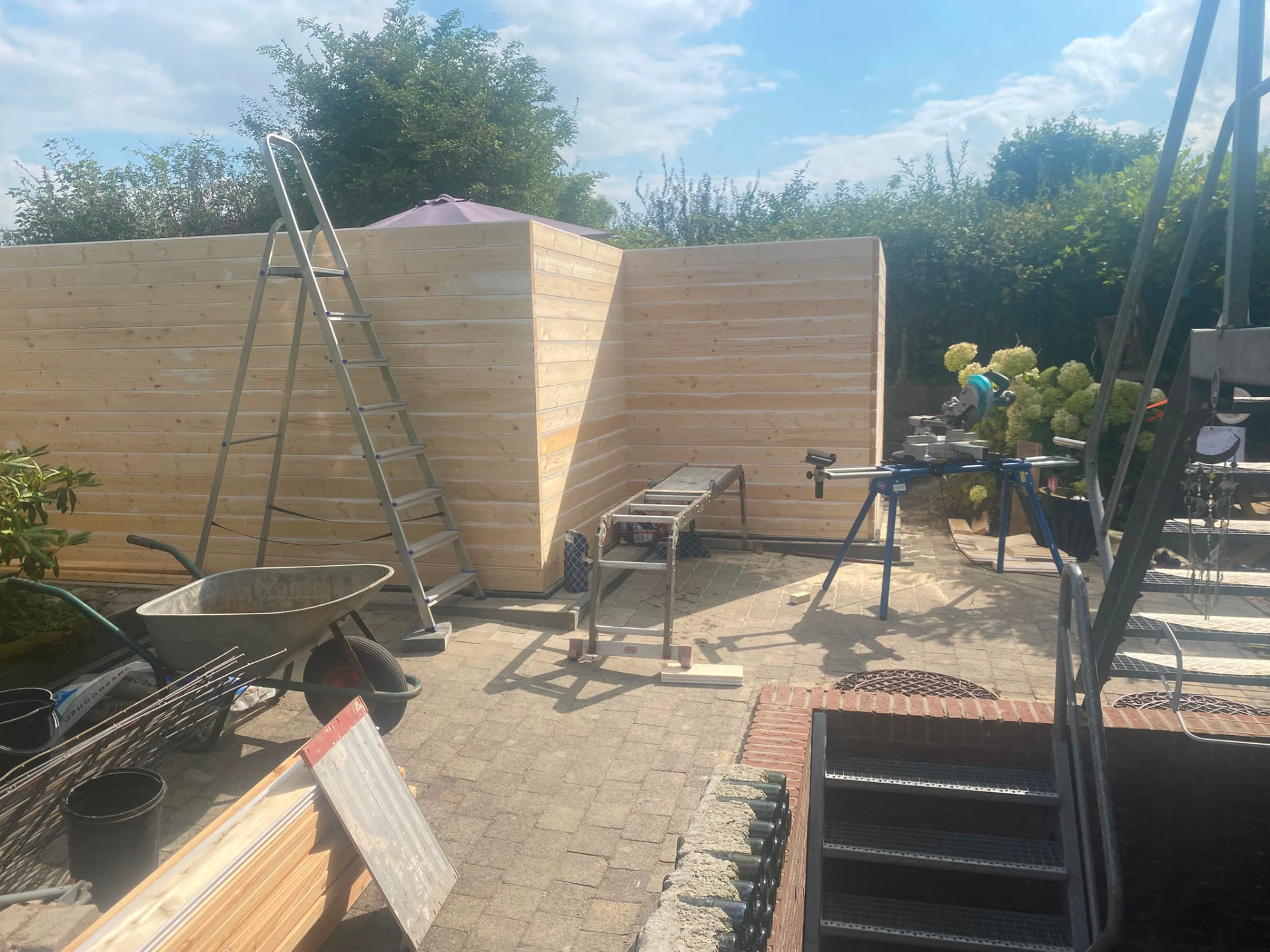 New timber panelled wall built during a complete garden renovation