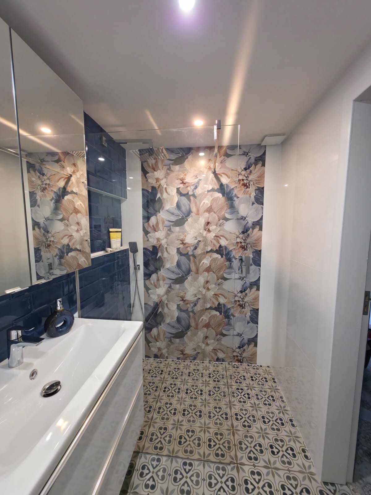 Close-up of decorative floral patterned bathroom wall tiles