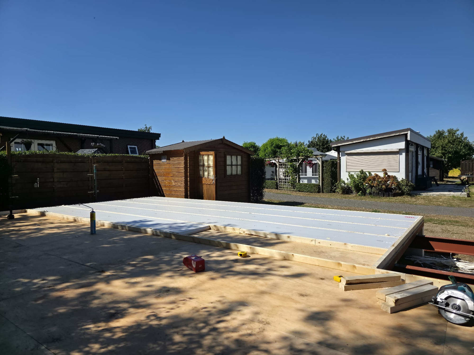 Floor insulation and timber edging fitted across the new base platform